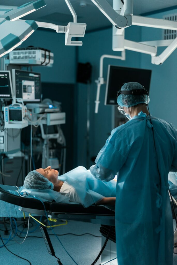 surgeon operating patient in operating room